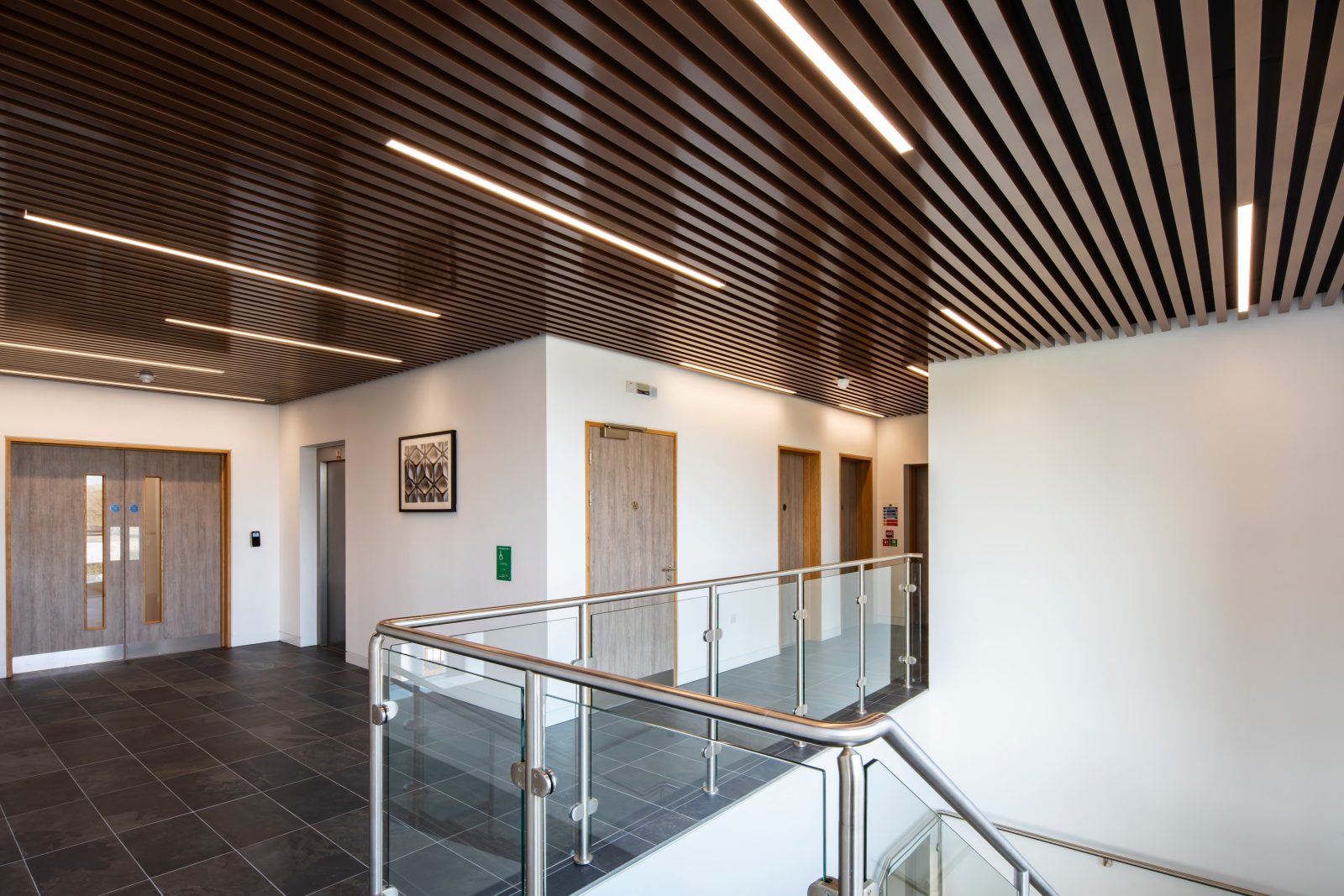 Recessed integrated lights in a wall-to-wall configuration